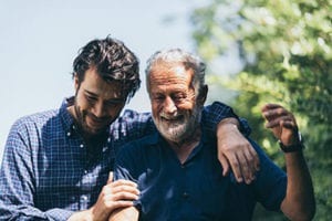 son embraces father after he completes alcohol addiction treatment program