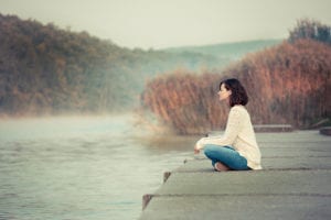 woman with Anxiety Disorders on a dock