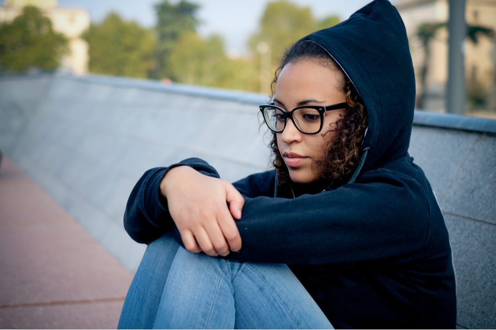 Young woman whose environment affects mental health