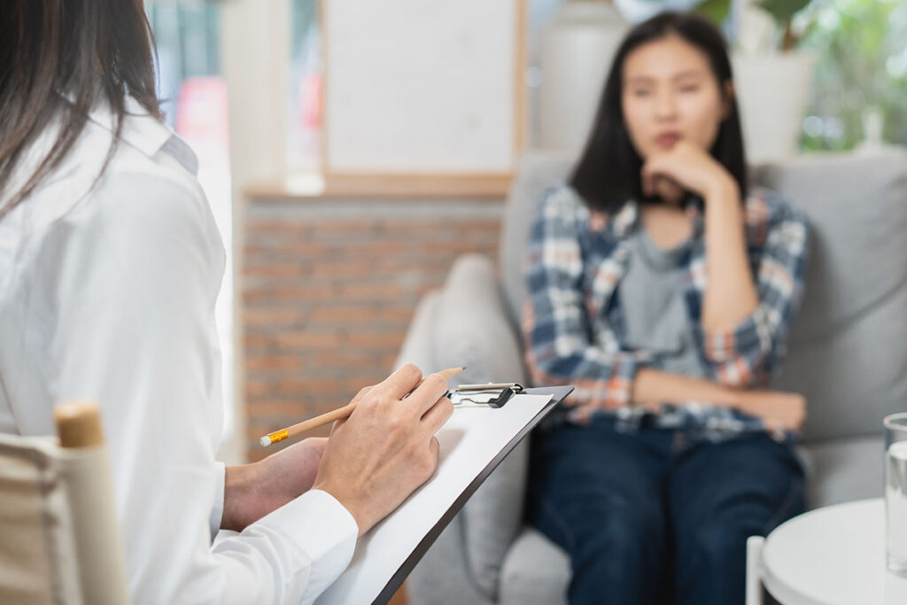 Women discussing dual diagnosis symptoms