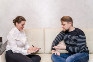 Two people talking during an ACT therapy session